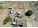 Aerial view showcases a pool, horse facilities, and a meticulously maintained property at 3720 E Vista Grande --, San Tan Valley, AZ 85140