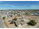 Aerial view showcasing property with horse area, pool, and surrounding neighborhood at 3720 E Vista Grande --, San Tan Valley, AZ 85140