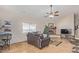 Inviting living room with a brick fireplace, cozy seating, and a neutral color palette at 3720 E Vista Grande --, San Tan Valley, AZ 85140
