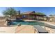 Backyard pool with a waterfall feature and a patio with lounge chairs offering a relaxing outdoor space at 3720 E Vista Grande --, San Tan Valley, AZ 85140