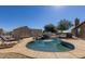 Refreshing in-ground pool features a rock waterfall and lounging area at 3720 E Vista Grande --, San Tan Valley, AZ 85140