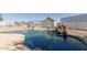 Inviting in-ground pool with a rock waterfall feature, perfect for relaxation and enjoyment at 3720 E Vista Grande --, San Tan Valley, AZ 85140