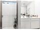 Clean bathroom featuring a glass enclosed shower and white vanity at 40441 W Hillman Dr, Maricopa, AZ 85138