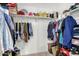 Walk-in closet with ample storage space and shelving at 40441 W Hillman Dr, Maricopa, AZ 85138