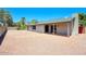 Spacious backyard featuring low maintenance desert landscaping and privacy fence at 4079 E Shangri La Rd, Phoenix, AZ 85028