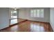 Elegant living room with hardwood floors, large windows and seamless indoor/outdoor living at 4079 E Shangri La Rd, Phoenix, AZ 85028