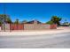 Street view showcasing a well-maintained home with perimeter block fencing for privacy at 4079 E Shangri La Rd, Phoenix, AZ 85028