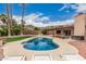 Backyard featuring a private in-ground pool, covered patio, lounge chairs, and mountain views at 4229 E Pearce Rd, Phoenix, AZ 85044