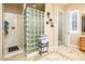 Bathroom featuring a block glass shower at 42293 W Good Vibrations Ln, Maricopa, AZ 85138