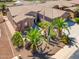 Beautiful front yard with desert landscaping, plants, and decorative cacti surrounding this single Gathering house at 42293 W Good Vibrations Ln, Maricopa, AZ 85138
