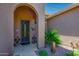 Beautiful front door with security screen and decorative accents at 42293 W Good Vibrations Ln, Maricopa, AZ 85138