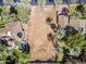 Aerial view of empty residential lot in a neighborhood with lush vegetation and nice homes at 4419 N 46Th Pl, Phoenix, AZ 85018