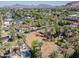 Aerial view of a residential neighborhood with a vacant lot surrounded by mature landscaping and other homes at 4419 N 46Th Pl, Phoenix, AZ 85018