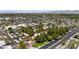 Expansive aerial view of a residential community, showcasing the lush green landscape and neighborhood layout at 4704 E Paradise Village N Pkwy # 236, Phoenix, AZ 85032