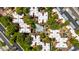Aerial view showcasing the community's layout, landscaping, and pool area from above at 4704 E Paradise Village N Pkwy # 236, Phoenix, AZ 85032