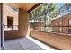 A balcony view showcasing the surrounding community and shaded outdoor space at 4704 E Paradise Village N Pkwy # 236, Phoenix, AZ 85032