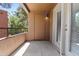 Cozy outdoor balcony area with neutral tones, perfect for relaxing and enjoying the fresh air at 4704 E Paradise Village N Pkwy # 236, Phoenix, AZ 85032