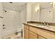 Clean bathroom featuring a shower-tub combo, and a granite counter at 4704 E Paradise Village N Pkwy # 236, Phoenix, AZ 85032