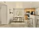 Dining room featuring lots of natural light and a bar area at 4704 E Paradise Village N Pkwy # 236, Phoenix, AZ 85032