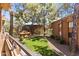 A community featuring a manicured lawn, landscaping, and shaded picnic area at 4704 E Paradise Village N Pkwy # 236, Phoenix, AZ 85032