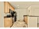 Kitchen features stainless appliances, tiled floors and maple cabinetry at 4704 E Paradise Village N Pkwy # 236, Phoenix, AZ 85032