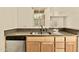A well lit kitchen featuring stainless steel appliances and granite countertops at 4704 E Paradise Village N Pkwy # 236, Phoenix, AZ 85032