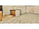Open living space with a view into the kitchen and access to the balcony/patio at 4704 E Paradise Village N Pkwy # 236, Phoenix, AZ 85032