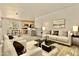 Bright and airy living room featuring stylish decor and an open-concept design at 4704 E Paradise Village N Pkwy # 236, Phoenix, AZ 85032