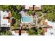 Inviting aerial view of the community pool and lounge area with manicured landscaping and seating at 4704 E Paradise Village N Pkwy # 236, Phoenix, AZ 85032