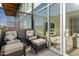 Private outdoor balcony with comfortable seating, perfect for relaxation and enjoying the view at 4747 N Scottsdale Rd # 4003, Scottsdale, AZ 85251