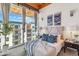 Comfortable bedroom with a large window showcasing neighborhood views and stylish furnishings at 4747 N Scottsdale Rd # 4003, Scottsdale, AZ 85251