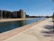Scenic community canal with a paved walkway provides a tranquil environment for residents to enjoy at 4747 N Scottsdale Rd # 4003, Scottsdale, AZ 85251