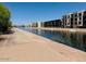 The community canal is lined with modern residences, creating a picturesque waterfront setting at 4747 N Scottsdale Rd # 4003, Scottsdale, AZ 85251