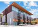Contemporary condo building with a wood overhang, concrete construction, large windows and a stylish facade at 4747 N Scottsdale Rd # 4003, Scottsdale, AZ 85251