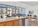Open-concept living space seamlessly blends kitchen, dining, and living areas, creating an inviting atmosphere at 4747 N Scottsdale Rd # 4003, Scottsdale, AZ 85251