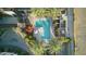 Aerial view of a resort style pool with lush landscaping and relaxing lounge areas at 4747 N Scottsdale Rd # 4003, Scottsdale, AZ 85251