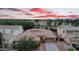 Beautiful aerial view of a home with a tile roof and a well-manicured yard at 4756 E Ironhorse Rd, Gilbert, AZ 85297