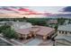 Stunning aerial view of a home with a tile roof and circular architectural detail at 4756 E Ironhorse Rd, Gilbert, AZ 85297