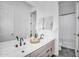 Modern bathroom with double sinks, granite countertop, and contemporary fixtures at 4756 E Ironhorse Rd, Gilbert, AZ 85297