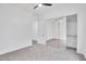 Neutral bedroom with mirrored closet doors and access to attached room at 4756 E Ironhorse Rd, Gilbert, AZ 85297