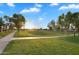 Scenic community park with walking paths, grassy areas, and mature trees at 4756 E Ironhorse Rd, Gilbert, AZ 85297