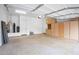 Spacious garage with ample storage cabinets and epoxy flooring at 4756 E Ironhorse Rd, Gilbert, AZ 85297