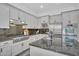 Bright kitchen with updated appliances, granite countertops, and stylish cabinetry at 4756 E Ironhorse Rd, Gilbert, AZ 85297
