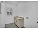 Practical laundry room with sink and window for natural light at 4756 E Ironhorse Rd, Gilbert, AZ 85297