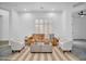 Bright living room featuring modern furnishings, a neutral rug and a shuttered window at 4756 E Ironhorse Rd, Gilbert, AZ 85297