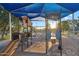 Playground area with slides, climbing structures and shade canopies for a fun day of community play at 4756 E Ironhorse Rd, Gilbert, AZ 85297