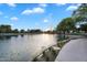 Scenic pond view with walking path and lush greenery in a serene community setting at 4756 E Ironhorse Rd, Gilbert, AZ 85297