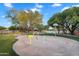 Community splash pad with fun water features and landscaping, perfect for cooling off on hot days at 4756 E Ironhorse Rd, Gilbert, AZ 85297