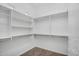 Large walk-in closet featuring ample shelving and hanging rods at 4756 E Ironhorse Rd, Gilbert, AZ 85297