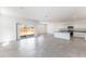 Open concept living area with kitchen and dining combo featuring tile flooring and abundant natural light at 5053 E Umber Rd, San Tan Valley, AZ 85143